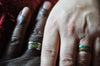 Rasta Titanium Ring on clients hands - Hawaii Titanium Rings